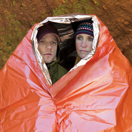 Survive Outdoors Longer emergency blanket used outdoors