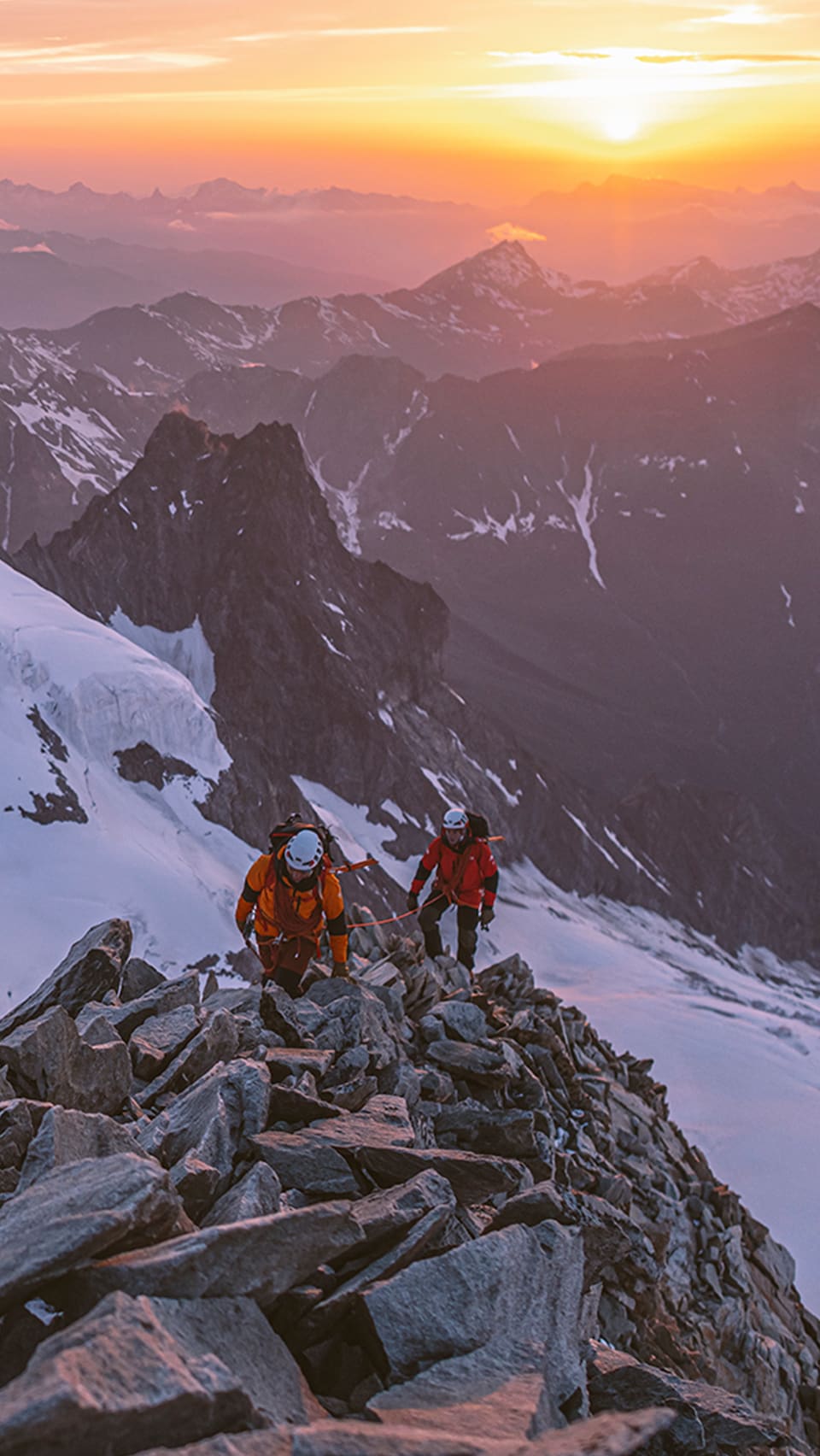 The North Face athletes climbing in snowy alpine terrain