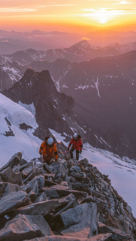 The North Face athletes climbing in snowy alpine terrain