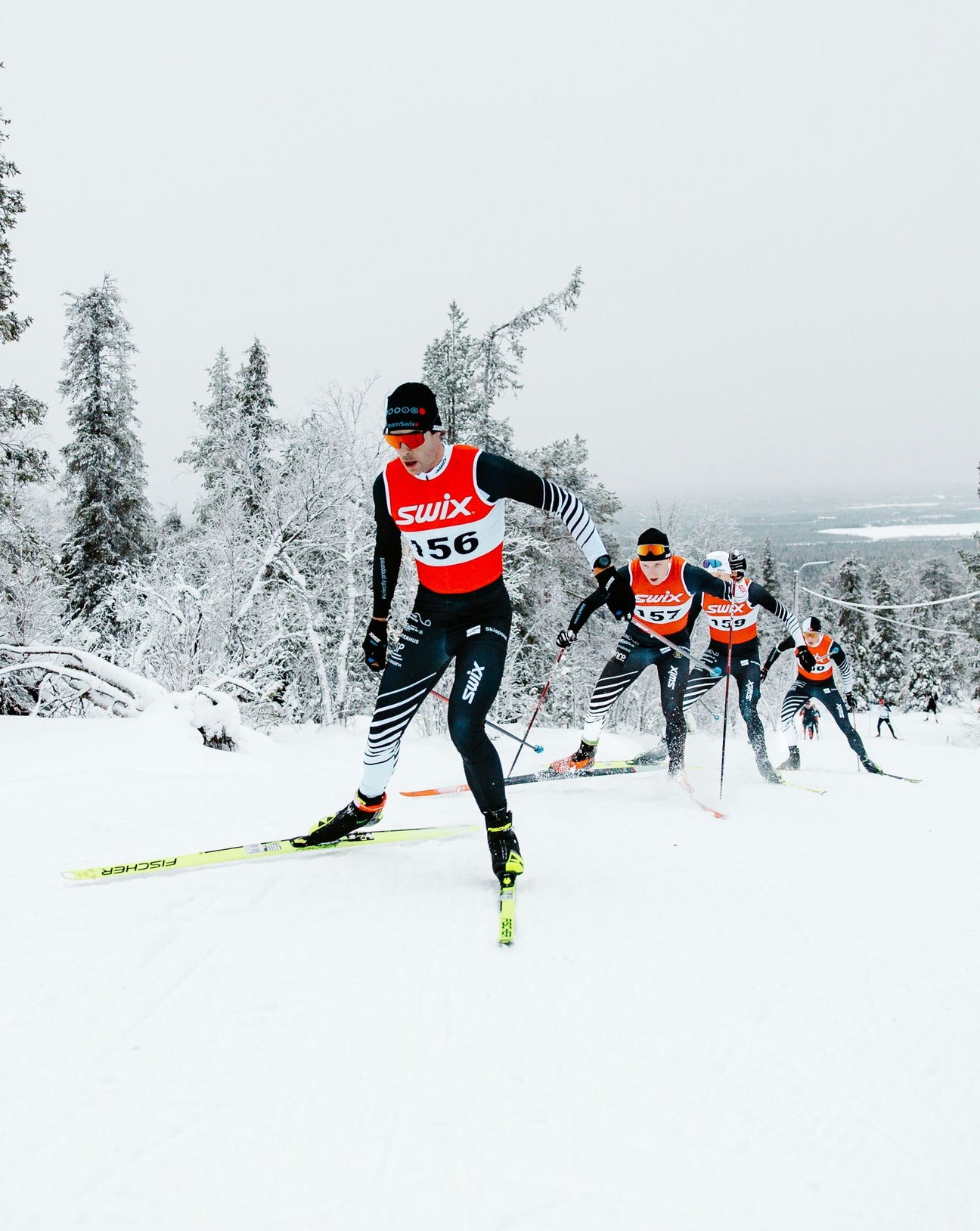 Swix cross-country skiers racing on snow