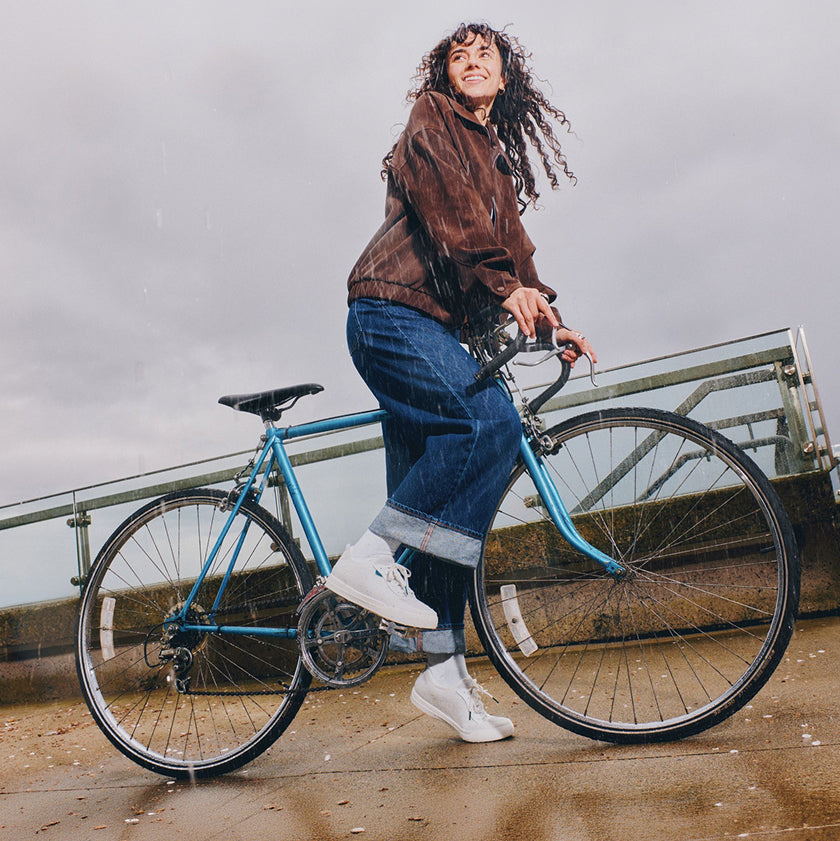 Vessi waterproof shoes worn while cycling in wet weather