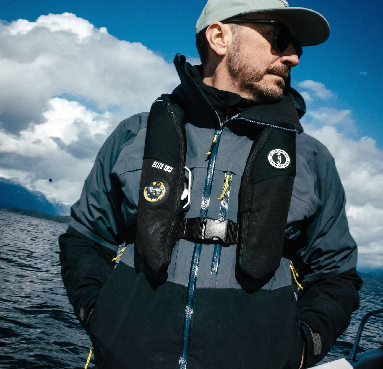 Paddler wearing a Mustang Survival inflatable PFD on open water