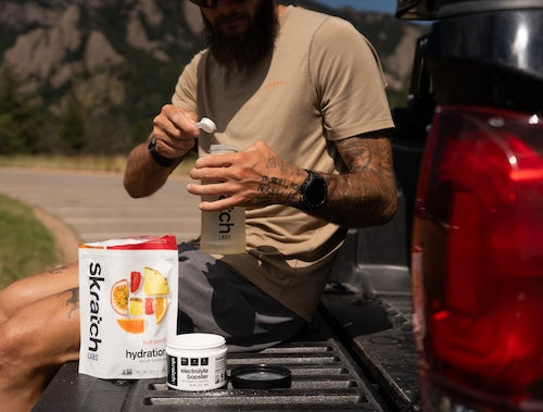 Runner using Skratch Labs hydration mix outdoors