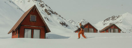 Atlas snowshoer hiking through snowy terrain