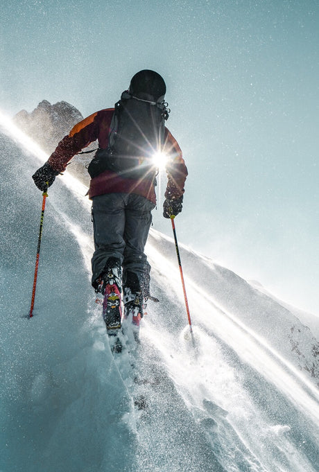 Blizzard ski lifestyle image in mountain terrain