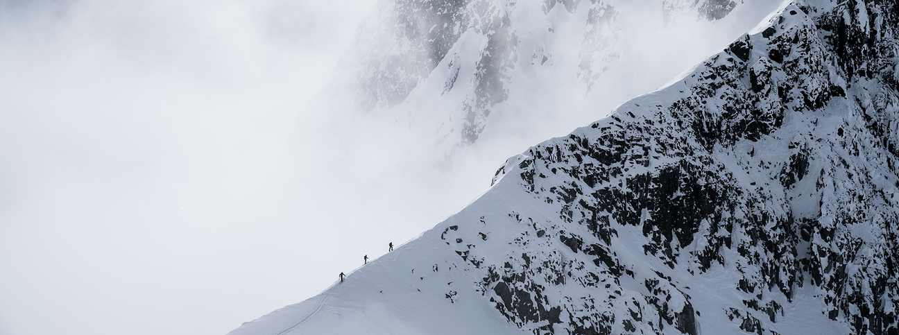 Arc'teryx mountain athletes on snowy alpine terrain