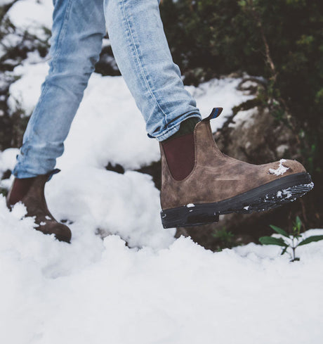 Blundstone Chelsea boots walking through snow