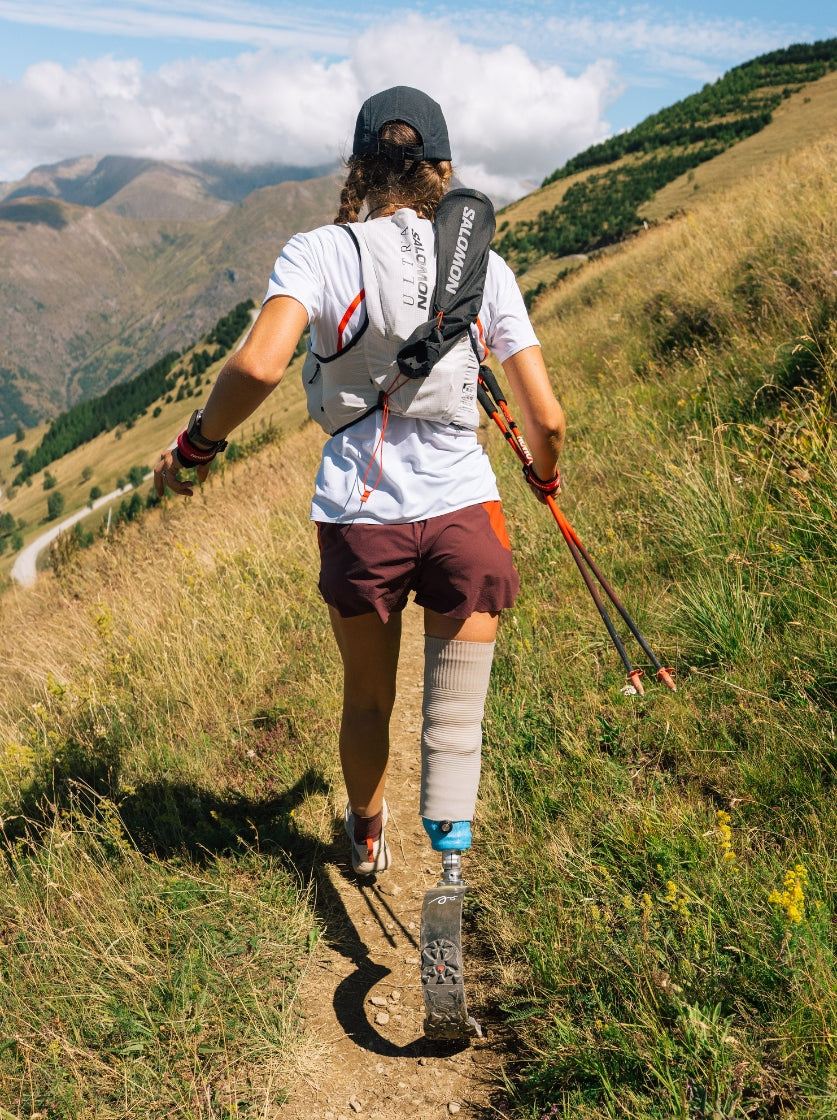 Salomon athletes moving through mountain terrain